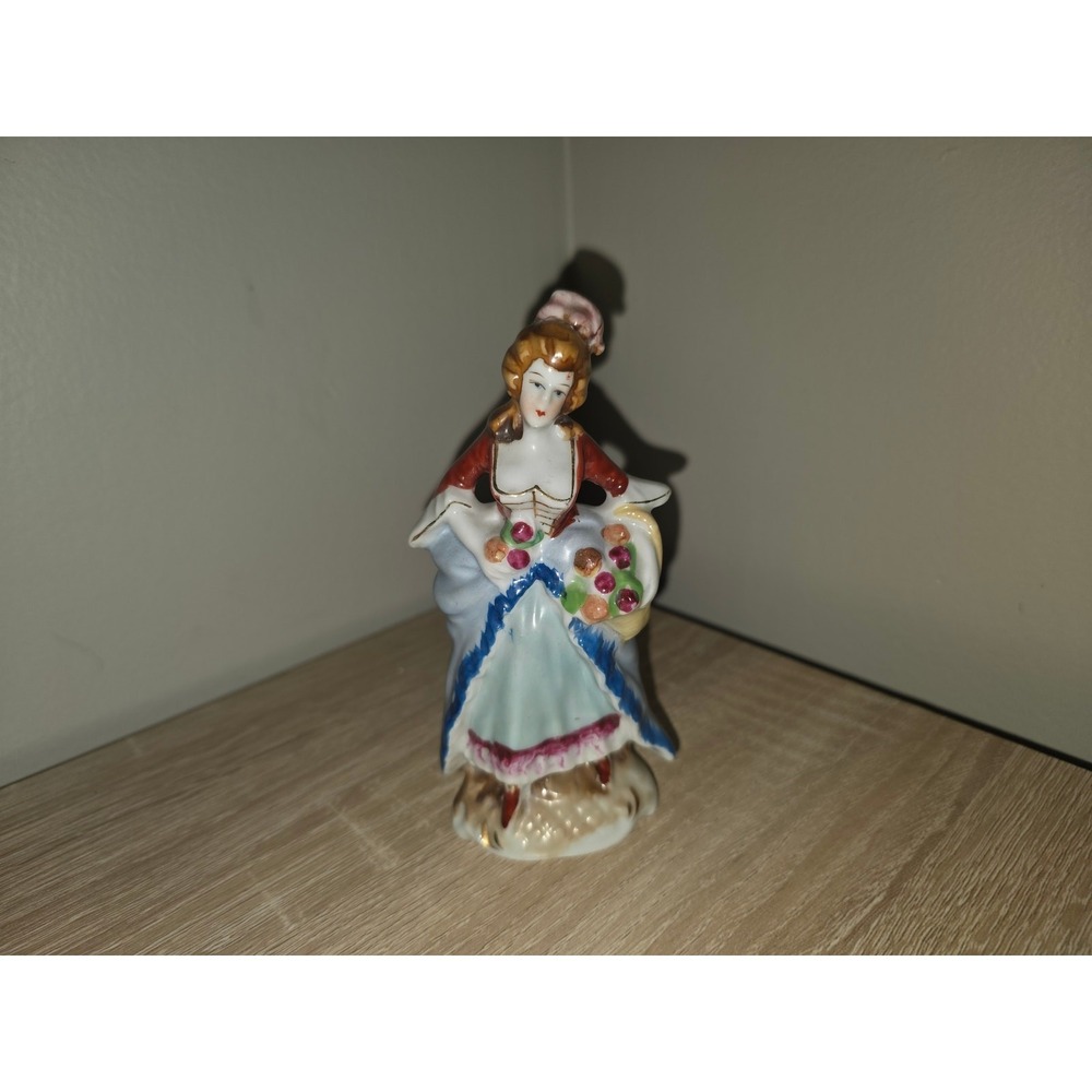 Vintage Occupied Japan Porcelainβ Colonial Woman Figurine Flower Basket Red Blue